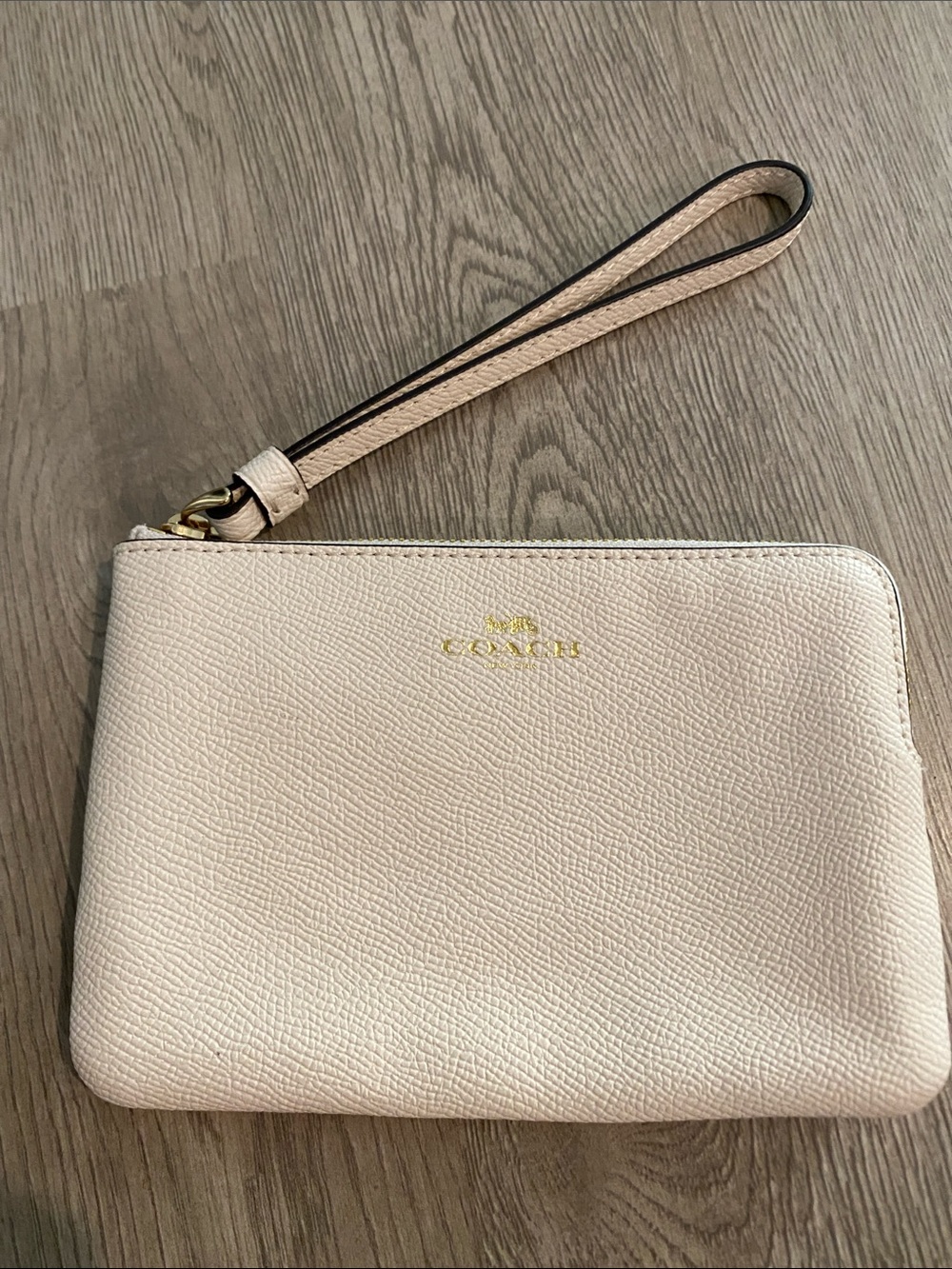 Coach Pebbled Leather Wristlet in Pale Pink with Gold Logo